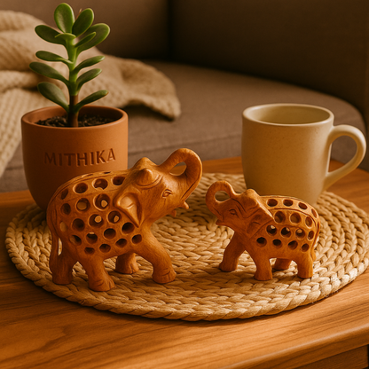 Handcrafted Wooden Elephant Family – Intricate Jali Work Décor