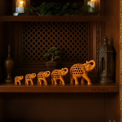 Handcrafted Wooden Elephant Family – Intricate Jali Work Décor