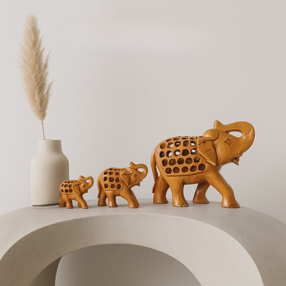 Handcrafted Wooden Elephant Family – Intricate Jali Work Décor