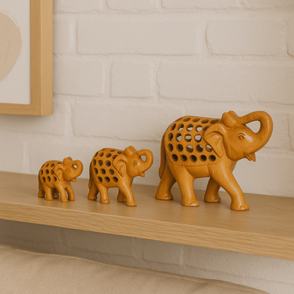 Handcrafted Wooden Elephant Family – Intricate Jali Work Décor