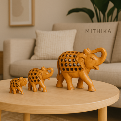 Handcrafted Wooden Elephant Family – Intricate Jali Work Décor